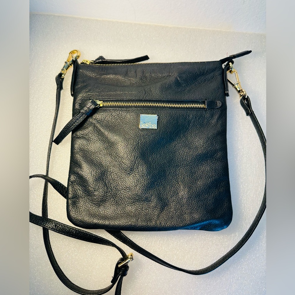 Kooba Black Pebble leather Cross bag With Purple Print Lining